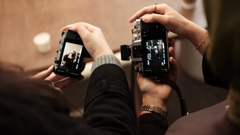 Two photographers capturing moments with cameras indoors in Gaziantep, Türkiye.